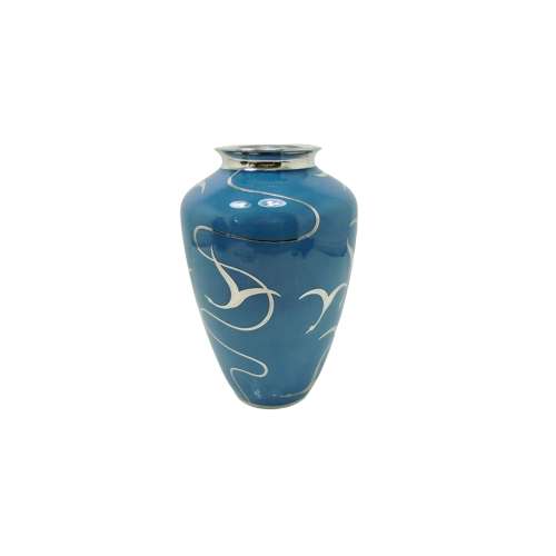 An exciting and rare silver overlay vase