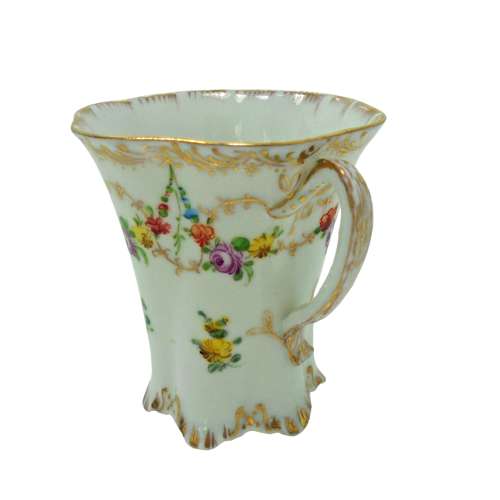 A Versailles shape Donath Dresden decorated chocolate cup & saucer