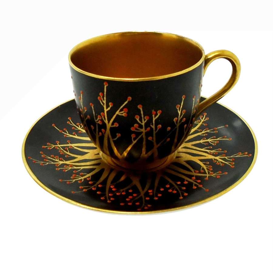 A jewelled Royal Worcester demitasse cup & saucer