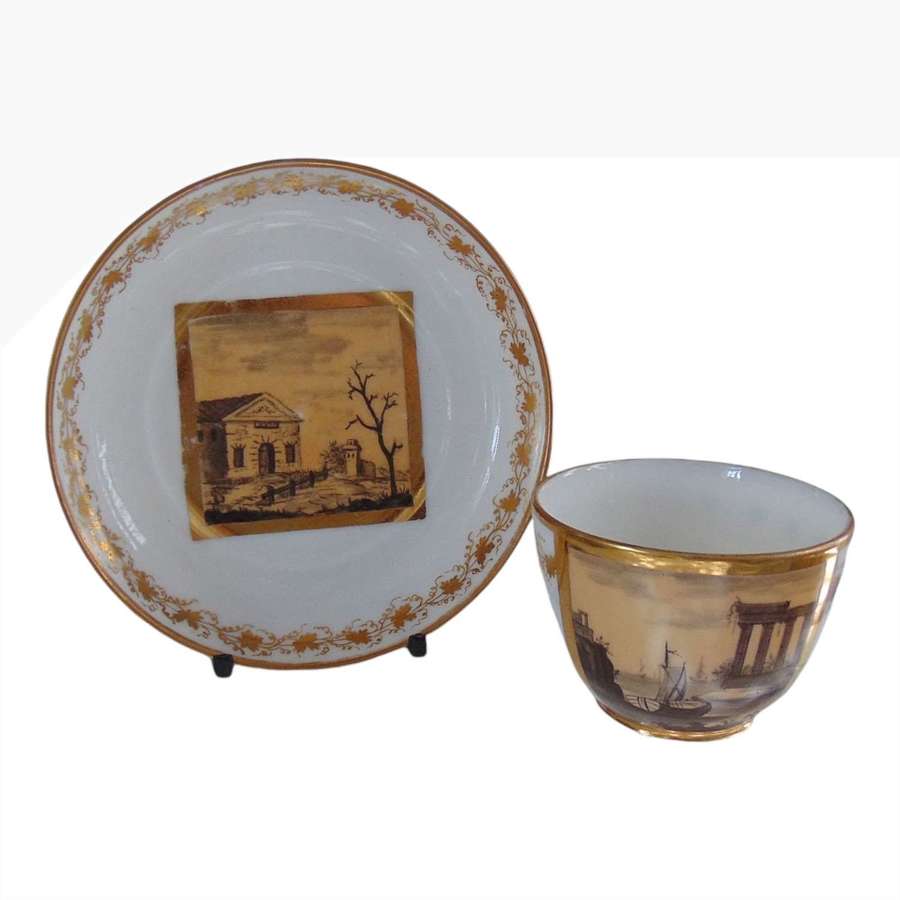 Continental Porcelain cup & saucer en grisaille topographical scenes