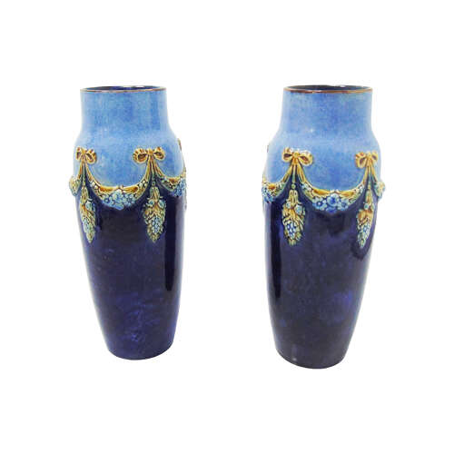 Pair of  Doulton Lambeth stoneware vases signed by Minnie Webb